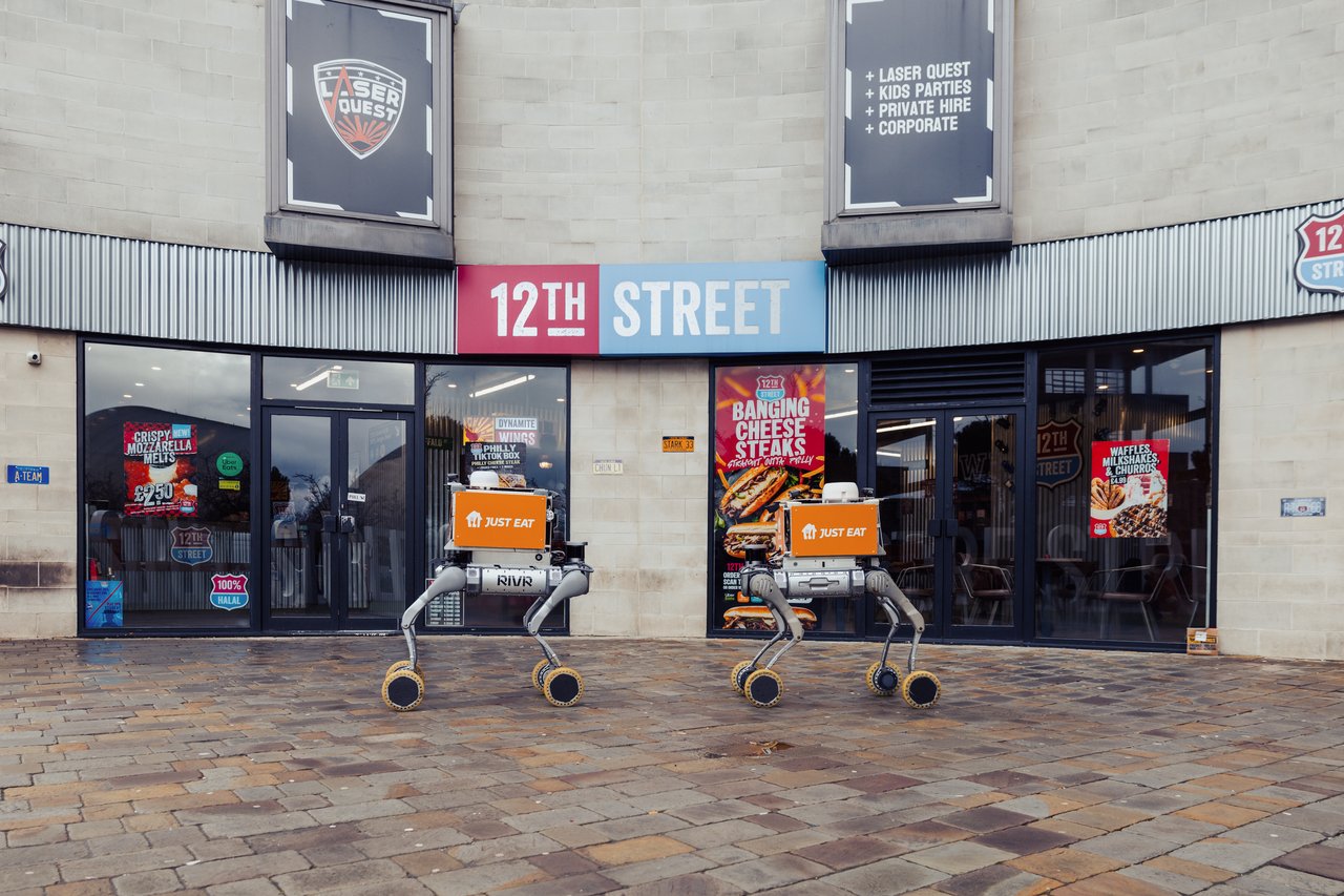 Rivr delivery robot navigating urban streets on its four wheeled legs