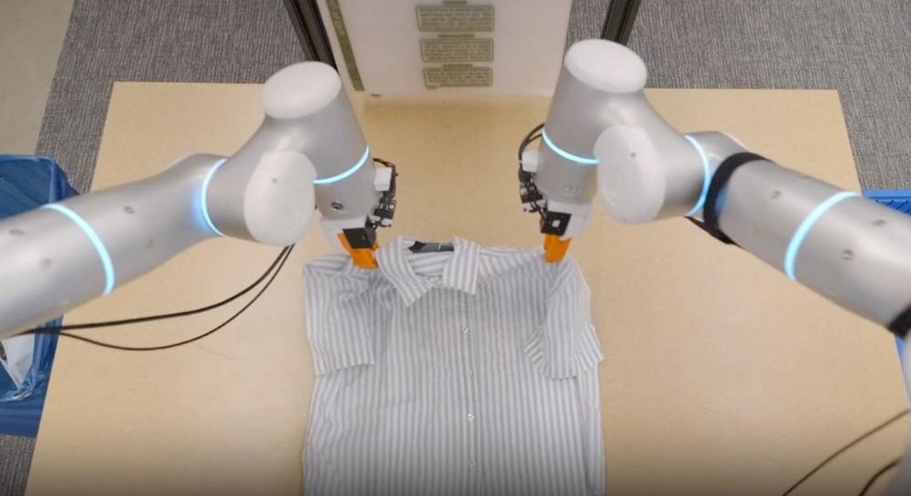 Rhoda AI robot demonstrating cloth folding capability