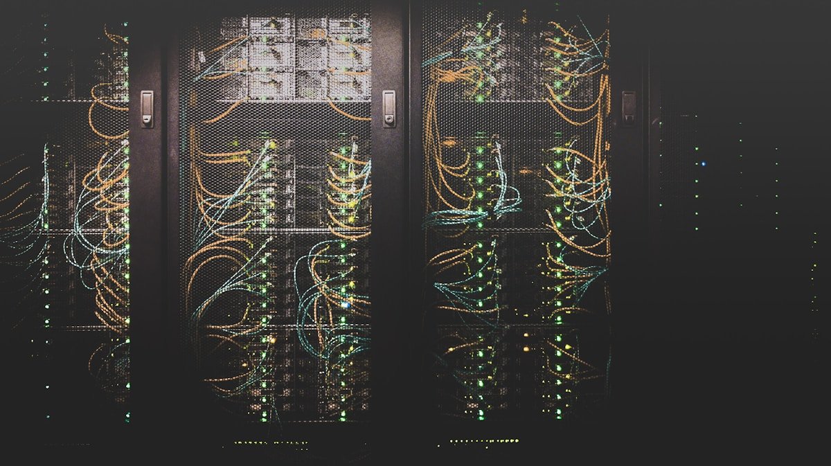 AI data center server infrastructure showing racks of GPU accelerators powering large language model training