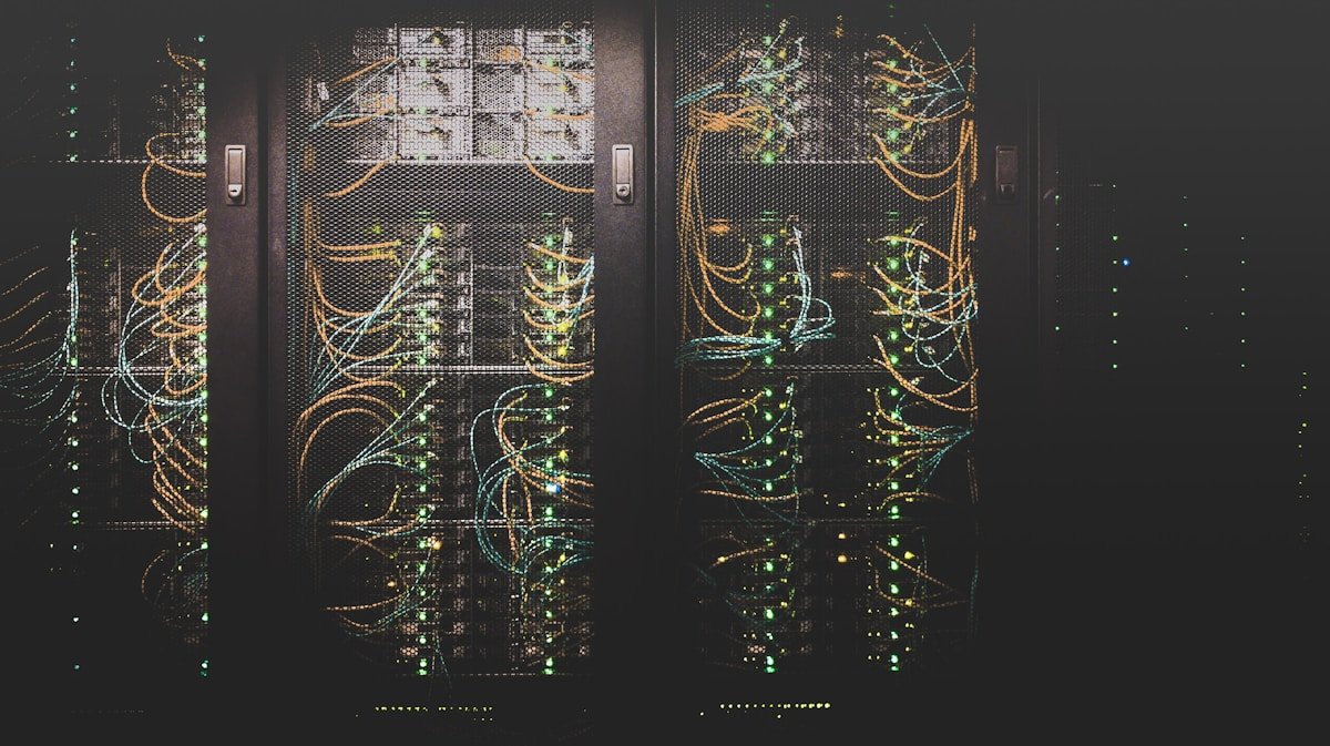 AI data center server rows representing the global AI automation infrastructure and chip manufacturing arms race