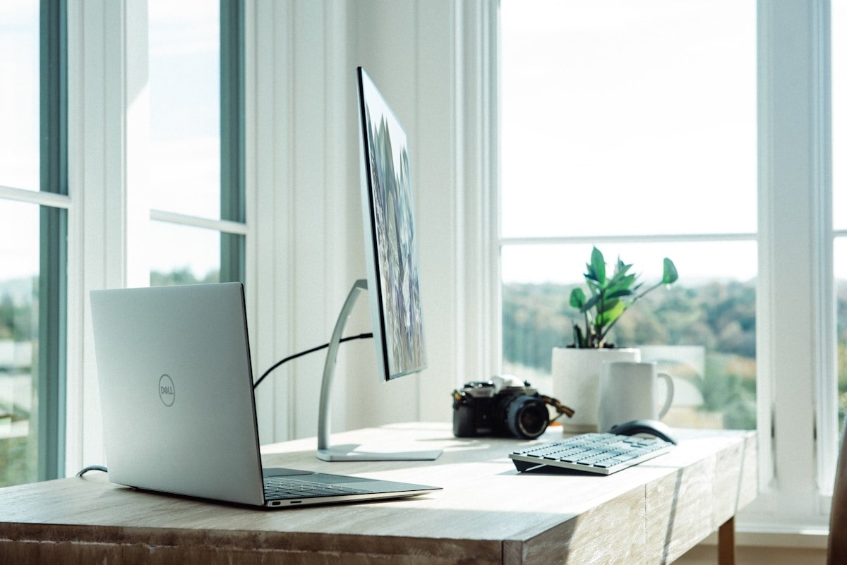 Microsoft AI PC laptop on desk representing stalled AI PC market sales and weak consumer demand for AI hardware